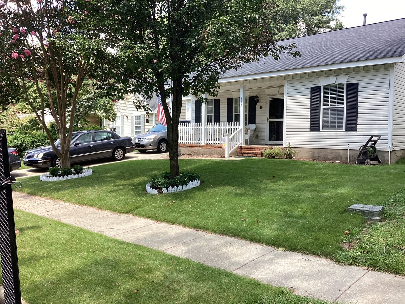 Lawn care service in Georgia with residential home and green lawn