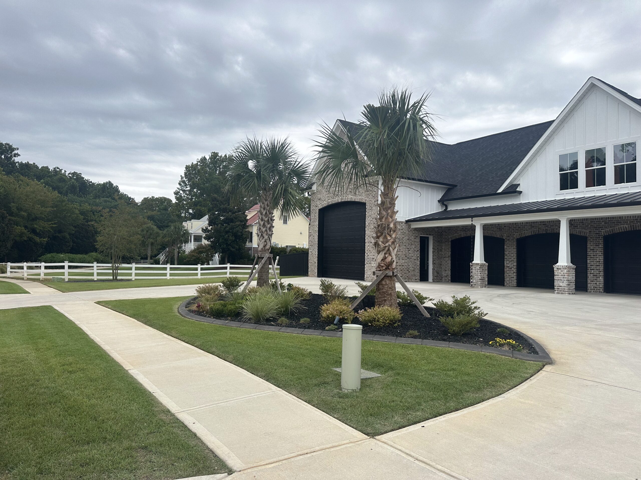 Lawn care service in Georgia with suburban home landscape